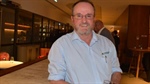 Alan Hoppe had no family farm to inherit, but corporate ag yielded far more