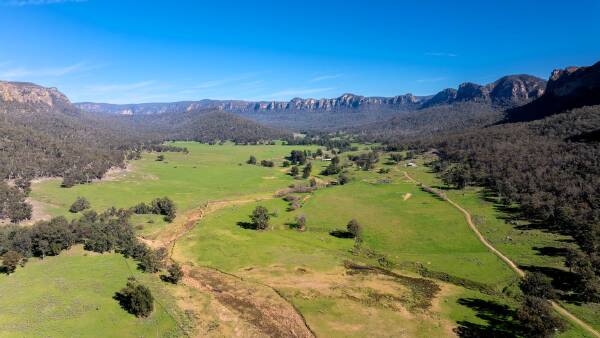 Dramatic sandstone escarpments, towering rock formations frame Emu Vale's productive cattle country | Video